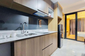 Fancy and Comfortable 1BR The Smith Alam Sutera Apartment By Travelio